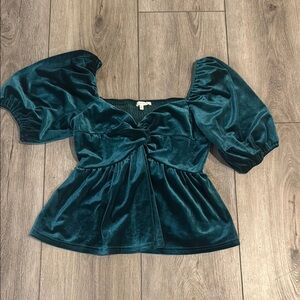 Green blouse with square neck puff sleeves and tie front